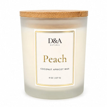 D&A Natural Peach coconut apricot wax candle in a frosted glass jar with a bamboo lid