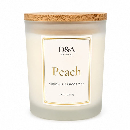 D&A Natural Peach coconut apricot wax candle in a frosted glass jar with a bamboo lid